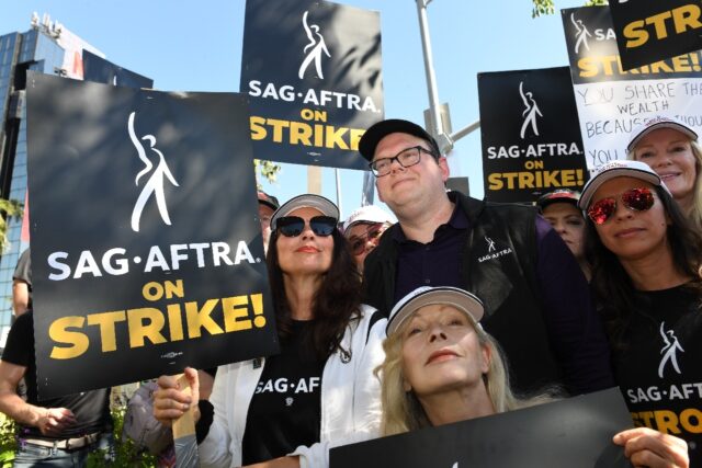 SAG-AFTRA President Fran Drescher was swarmed by fellow actors outside Netflix as the Holl