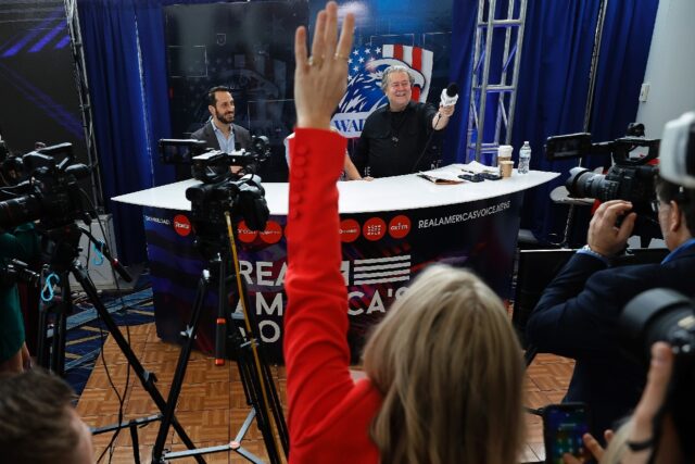 Steve Bannon (R), former advisor to former US president Donald Trump, hosts his War Room p