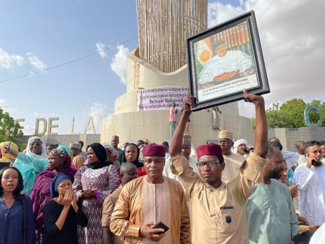 Supporters of Niger's President Bazoum gather in Nimaey to show their support for the deta
