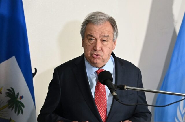 UN Secretary-General Antonio Guterres speaks to the media during his quick visit to Port-a