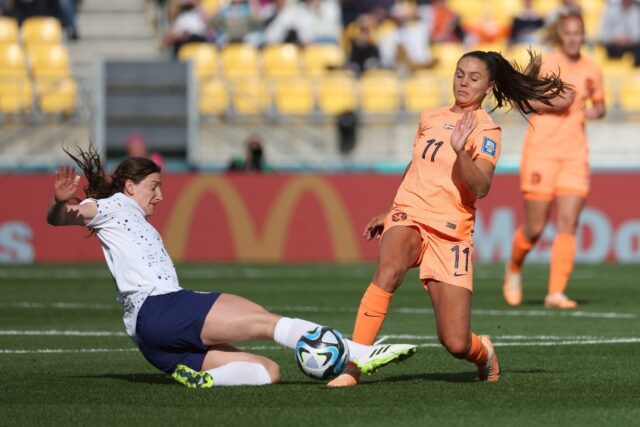 USA midfielder Andi Sullivan (L) challenges Lieke Martens of the Netherlands during the 1-
