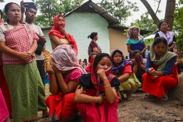 Women from the Meira Paibis group of the Meitei community in India's Manipur state gather