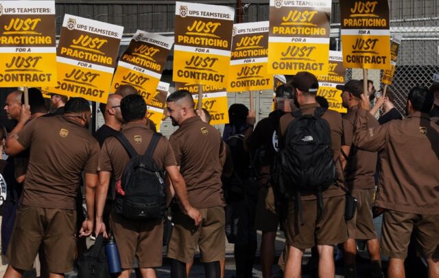 UPS workers held "practice picket" events earlier this month prior to announcing a tentati
