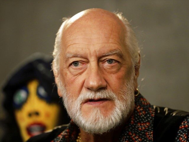 Mick Fleetwood, the drummer and co-founder of the band Fleetwood Mac speaks before the sta