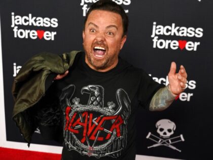 Jason "Wee Man" Acuna poses at the premiere of the film "Jackass Forever," Tuesday, Feb. 1, 2022, at the TCL Chinese Theatre in Los Angeles. (AP Photo/Chris Pizzello)