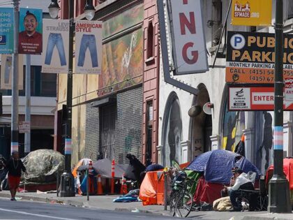 Tents line a sidewalk in the Tenderloin neighborhood of San Francisco on April 18, 2020. A federal judge ruled Wednesday, Aug. 10, 2022, that the pharmacy chain Walgreens can be held responsible for contributing to San Francisco's opioid crisis for over-dispensing opioids for years without proper oversight and failing to …