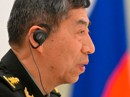 China's Defense Minister Gen. Li Shangfu speaks to Russian President Vladimir Putin a