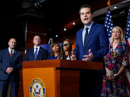 Rep. Matt Gaetz, R-Fla., speaks in front of members of the House Freedom Caucus during a news conference on Capitol Hill in Washington, Friday, July 14, 2023. House conservatives in a group known as the Freedom Caucus have unveiled a list of demands they want included in a stopgap spending …