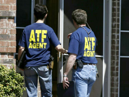 ATF agents walk into the home of Kaufman District Attorney Mike McLelland Monday, April 1,