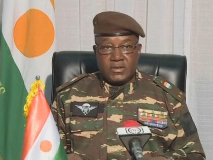 TOPSHOT - This video frame grab image obtained by AFP from ORTN - Télé Sahel on July 28, 2023 shows General Abdourahamane Tiani, Niger's new strongman, speaking on national television and reads a statement as "President of the National Council for the Safeguarding of the Fatherland", after the ouster of …