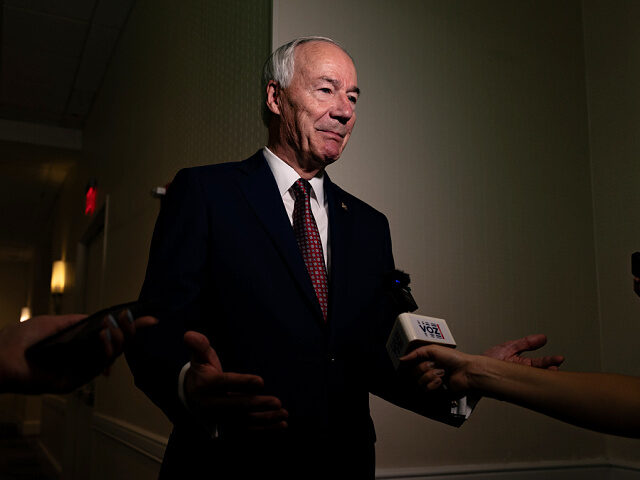 PHILADELPHIA, PENNSYLVANIA - JULY 1 Republican presidential candidate Asa Hutchinson speaks to press during the Moms for Liberty Summit in Philadelphia, Pennsylvania, 2023. (Photo by Hannah Beier for the Washington Post via Getty Images)