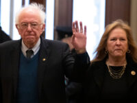 Hamas - Sen. Bernie Sanders, I-Vt., his wife, Jane O'Meara Sanders, arrive on Capitol Hill