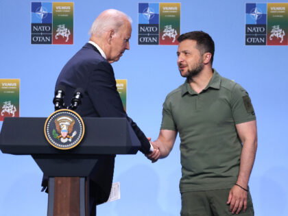 VILNIUS, LITHUANIA - JULY 12: Ukrainian President Volodomyr Zelensky (R) shakes hands with U.S. President Joe Biden following the announcement of the G7 nations' joint declaration for the support of Ukraine on July 12, 2023 in Vilnius, Lithuania. The event took place at the 2023 NATO Summit. (Photo by Sean …