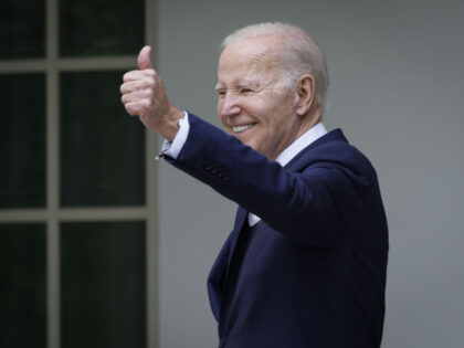 US President Joe Biden, waves back to the crowd during a National Small Business Week even