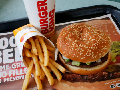FILE- This Feb. 1, 2018, file photo shows a Burger King Whopper meal combo at a restaurant