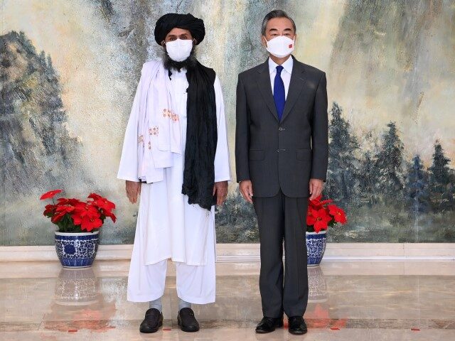 Chinese State Councilor and Foreign Minister Wang Yi meets with Mullah Abdul Ghani Baradar