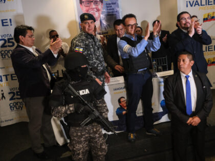 Christian Zurita, presidential candidate for the Construye party, center right, applauds
