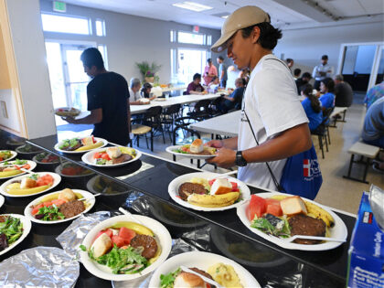 KAHANA, HI- AUGUST 15: Lunch is served at Citizen Church with the help of Mercy Chefts to