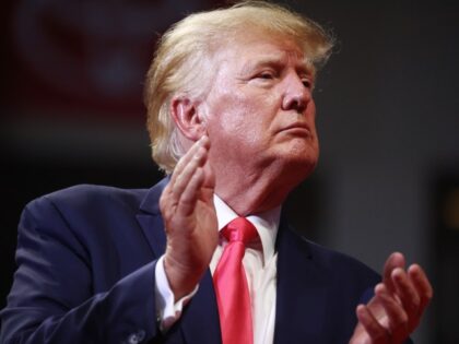 PRESCOTT VALLEY, ARIZONA - JULY 22: Former President Donald Trump applauds at a ‘Save America’ rally in support of Arizona GOP candidates on July 22, 2022 in Prescott Valley, Arizona. Arizona's primary election will take place August 2. (Photo by Mario Tama/Getty Images)