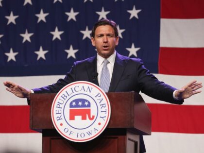 Ron DeSantis, governor of Florida, gestures as he speaks at the Republican Party Of Iowa&#
