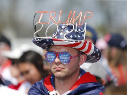 David Dumiter waits for the event to begin at the Save America rally at the Delaware County Fairgrounds, Saturday, April 23, 2022, in Delaware, Ohio. Former President Donald Trump will speak later in the day to endorse Republican candidates and turnout ahead of the May 3 Ohio primary. (Joe Maiorana/AP)