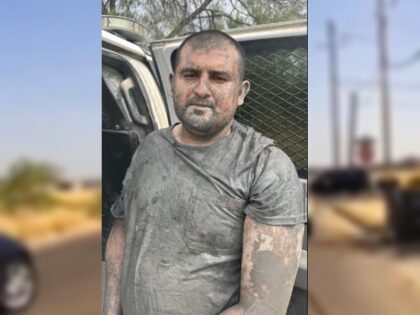 Texas DPS troopers and National Guard Soldiers arrest an alleged human smuggler near the R