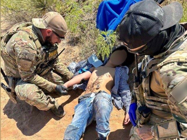 El Paso Sector agents rescue a dehydrated migrant after he illegally crossed the border between ports of entry. (U.S. Border Patrol/El Paso Sector)