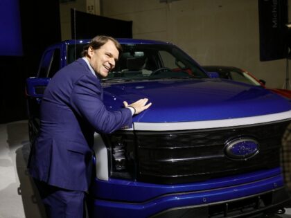 Ford CEO with F-150 Lightning Electric Truck