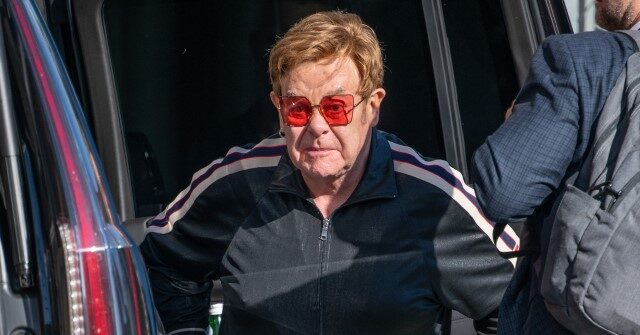 Elton John, 76, Hospitalized in France After Falling at Home