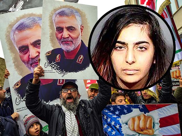 Protesters hold pictures of Iranian commander Qasem Soleimani, during a demonstration outs