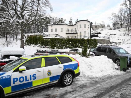 Police secures the area at a house where the Sweden's security service Sapo arrested two p