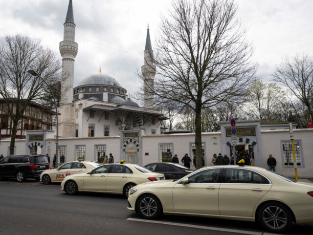 13 April 2023, Berlin: Cabs stand outside the Ditib-Sehitlik mosque shortly before a funer