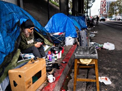 SAN DIEGO, CALIFORNIA - MARCH 24, 2023: Rachel Hayes lives under and near a freeway overpass along with hundreds of other people in a homeless encampment in downtown San Diego, California on Friday March 24, 2023. (Melina Mara/The Washington Post via Getty Images)