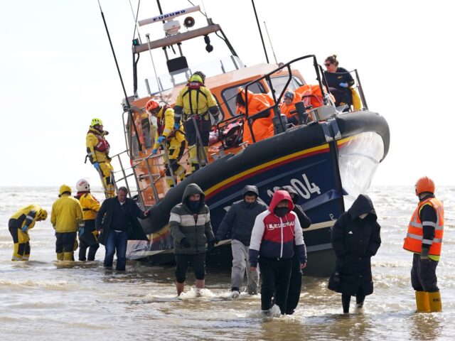 A group of people thought to be migrants are brought in to Dungeness, Kent, from the RNLI Dungeness Lifeboat, following a small boat incident in the Channel. Picture date: Thursday April 27, 2023. (Photo by Gareth Fuller/PA Images via Getty Images)