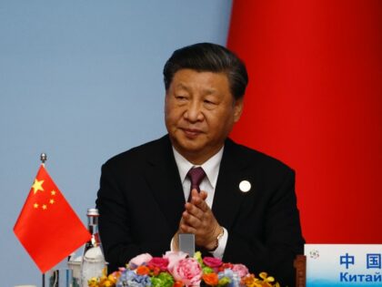 Chinese President Xi Jinping applauds during the joint press conference of the China-Centr