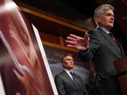 U.S. Sen. Bill Cassidy (R-LA) speaks as Sen. James Lankford (R-OK) listens during a news conference on abortion at the U.S. Capitol November 30, 2021 in Washington, DC. U.S. Supreme Court is scheduled to hear tomorrow the case Dobbs v. Jackson Women’s Health Organization, a challenge to Mississippi’s 15-week abortion …