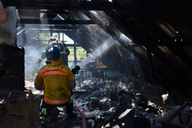 VERKHNYA TERSA, UKRAINE - 2023/07/13: Ukrainian State Emergency Service firefighters put o