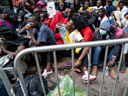 NEW YORK, NEW YORK - AUGUST 01: Dozens of recently arrived migrants to New York City camp