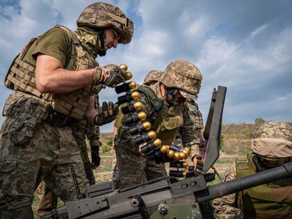 Ukrainian soldiers load a grenade launcher ammunition as Russia-Ukraine war continues in Donetsk Oblast, Ukraine on August 10, 2023. (Photo by Ignacio Marin/Anadolu Agency via Getty Images)