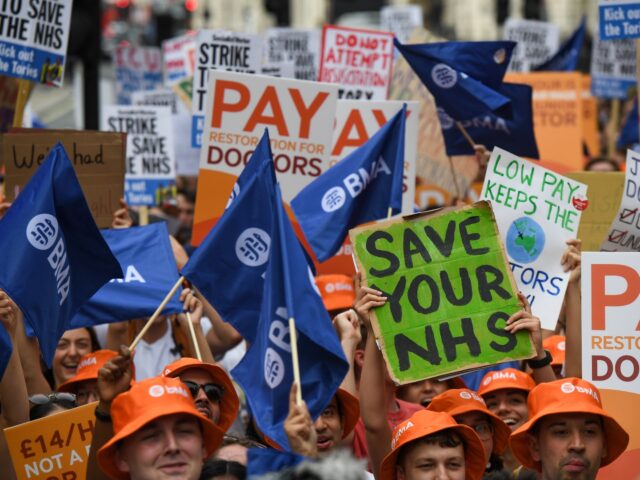 Junior doctors rally near Downing Street while striking in London, UK, on Friday, Aug. 11,