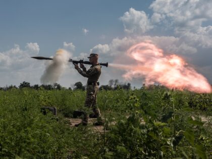 DONETSK OBLAST, UKRAINE - AUGUST 18: A Ukrainian soldier fires the RPG during a training a