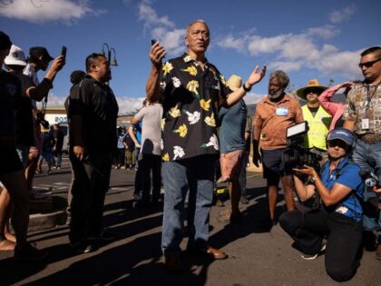 Maui County Mayor Richard Bissen speaks to volunteers after a press conference after visiting a distribution center in the aftermath of the Maui wildfires in Lahaina, Hawaii, on August 18, 2023. At least 111 people are known to have died in what was the deadliest wildfire in the US in …