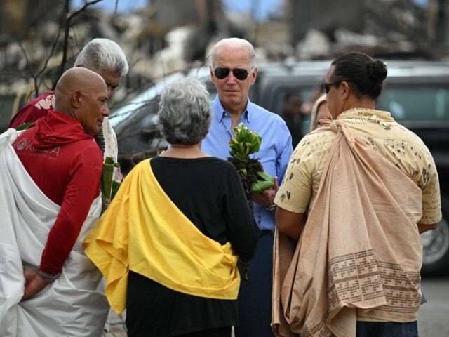 US President Joe Biden and US First Lady Jill Biden participate in a blessing ceremony with the Lahaina elders at Moku'ula following wildfires in Lahaina, Hawaii on August 21, 2023. The Bidens are expected to meet with first responders, survivors, and local officials following deadly wildfires in Maui. (Photo by …
