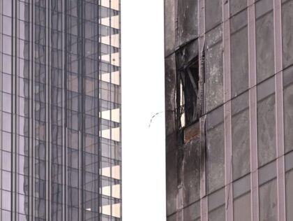 TOPSHOT - This photo shows a damaged building of the Moscow International Business Center (Moskva City) following a drone attack in Moscow on August 23, 2023. A Ukrainian drone attack on Moscow damaged a building in a central business district, authorities said on August 23, in the sixth straight night …