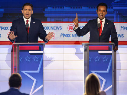 Republican presidential candidates (L-R), former U.S. Vice President Mike Pence, Florida Gov. Ron DeSantis and Vivek Ramaswamy participate in the first debate of the GOP primary season hosted by FOX News at the Fiserv Forum on August 23, 2023 in Milwaukee, Wisconsin. Eight presidential hopefuls squared off in the first …