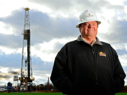 UNITED STATES - OCTOBER 22: Harold Hamm, chairman of Continental Resources Inc., stands for a photo near an oil rig outside Watonga, Oklahoma, U.S., on Wednesday, Oct. 22, 2008. Hamm, owner of a 150-person oil company in 1988, began leasing 30,000 acres of Montana and North Dakota prairie he knew …