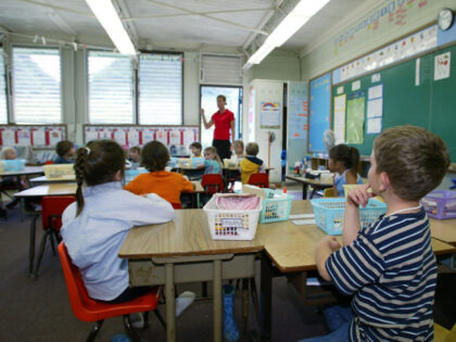 OAHU, HI - FEBRUARY 18: A kindergarten teacher prepares her students for a classroom lockd