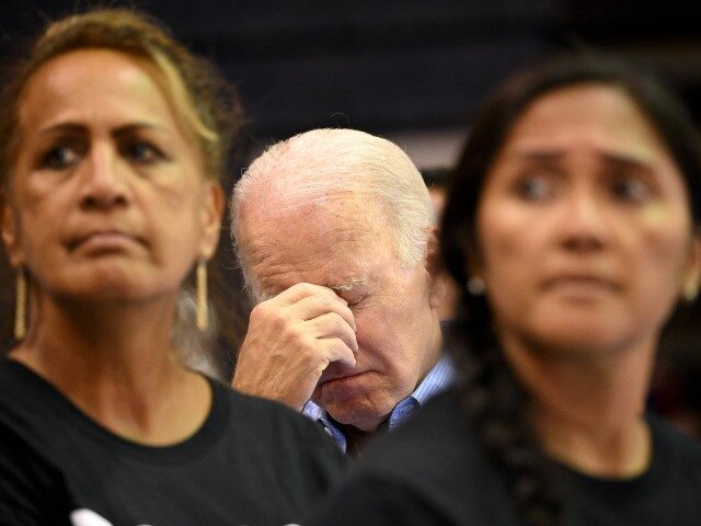 US President Joe Biden looks down as he listens to a speaker during a community engagement event at the Lahaina Civic Center in Lahaina, Hawaii on August 21, 2023. (MANDEL NGAN/AFP via Getty Images)