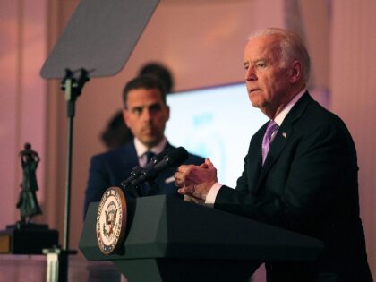 WASHINGTON, DC - APRIL 12: Hunter Biden (L) and U.S. Vice President Joe Biden speak on sta