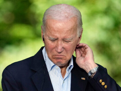 Prices - President Joe Biden listens during a joint news conference with Japan's Prime Minister Fumio Kishida and South Korea's President Yoon Suk Yeol on Friday, Aug. 18, 2023, at Camp David, the presidential retreat, near Thurmont, Md. (AP Photo/Andrew Harnik)